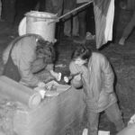 Search through the fire site in front of the Regional SNB Directorate building in Kanice, the district of Brno-venkov, on 8 December 1989.