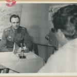 Reporters doing broadcast in the studio